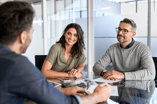 Smiling clients at a corporate event