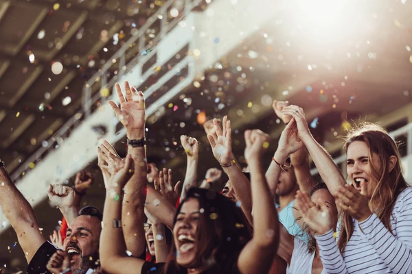 Guests cheering with confetti falling